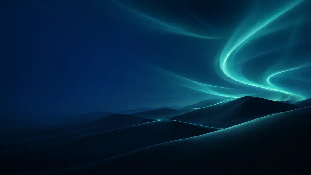 Desktop wallpaper with flowing teal light above dark dunes and a quiet deep-blue area on the left