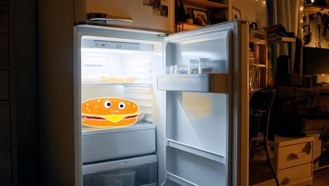 A cartoon burger in an open fridge